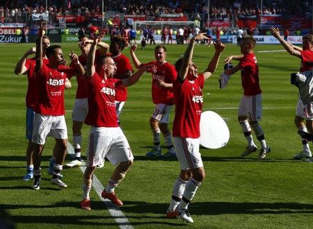 Football Soccer - FC Ingolstadt 04 v Bayern Munich - German Bundesliga - Audi Sportpark, Ingolstadt, Germany 07/05/16 Bayern Munich's players celebrate after match. REUTERS/Michaela Rehle.