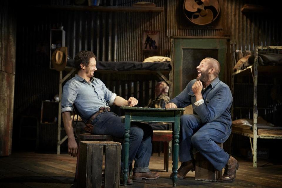 This image released by Polk & Co. shows James Franco, left, and Chris O'Dowd in a scene from "Of Mice and Men," in New York. (AP Photo/Polk & Co., Richard Phibbs)