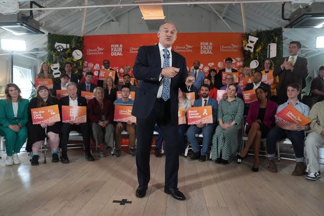 Sir Ed Davey with a group of Lib Dem supporters