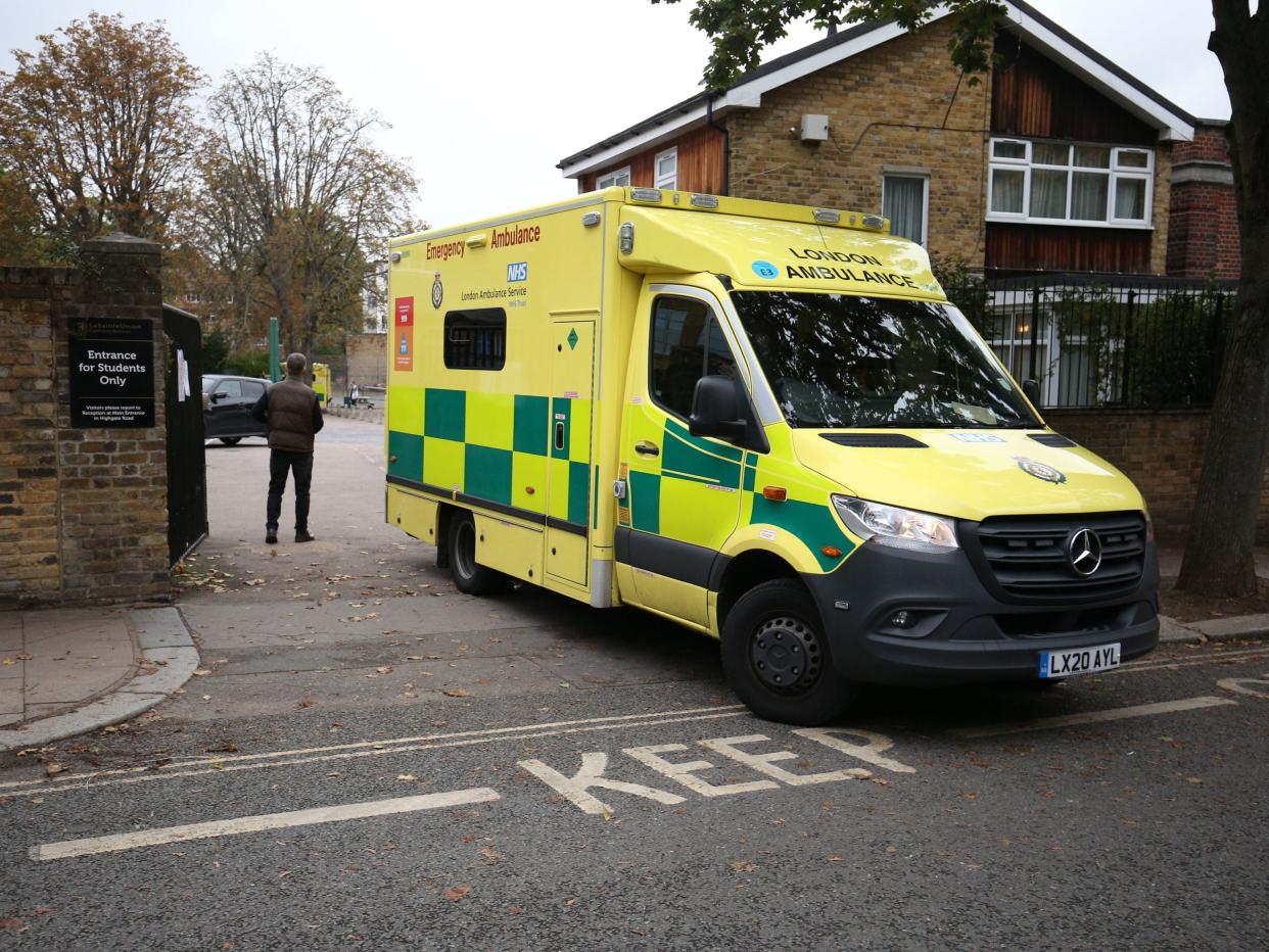 An ambulance leaves La Sainte Union Catholic School in Highgate, north London (PA)