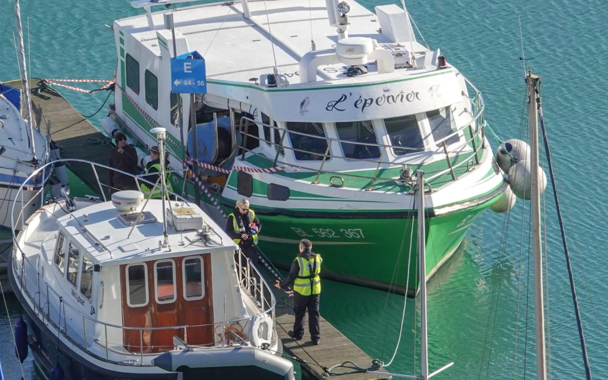 Twelve migrants arrived in Dover on the French trawler after setting sail from Boulogne-sur-Mer and crossing the Channel overnight - JIM BENNETT