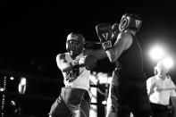 <p>Robert Henschel lands a punch on opponent Steve Konikoff during the Brooklyn Smoker outside Gargiulo’s Italian restaurant in Coney Island, Brooklyn, on Aug. 24, 2017. (Photo: Gordon Donovan/Yahoo News) </p>