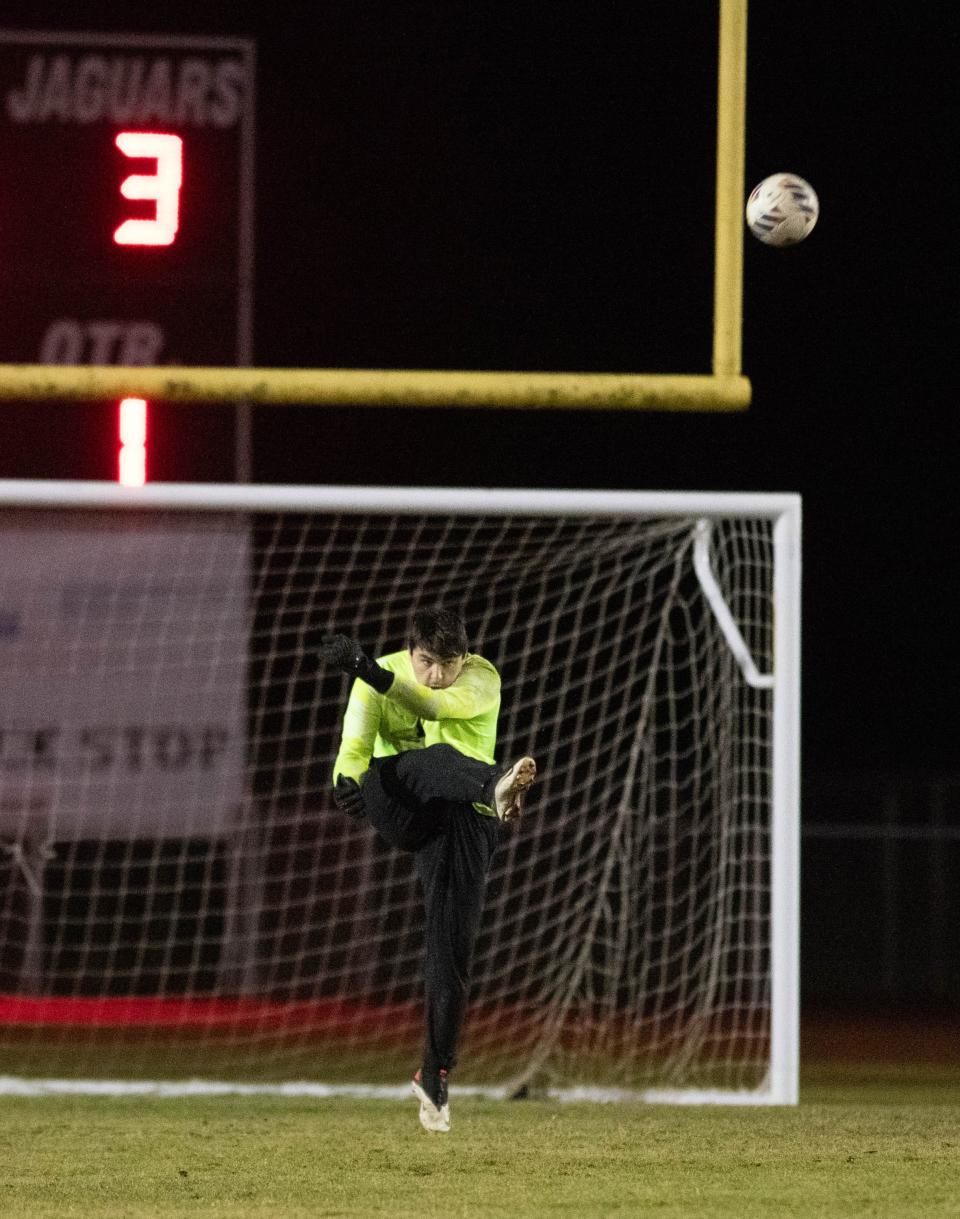 Jaguars goalkeeper Cole Willis (1) boots the ball up the pitch during the Pensacola vs West Florida boys soccer game at West Florida High School in Pensacola on Thursday, Jan. 25, 2024.