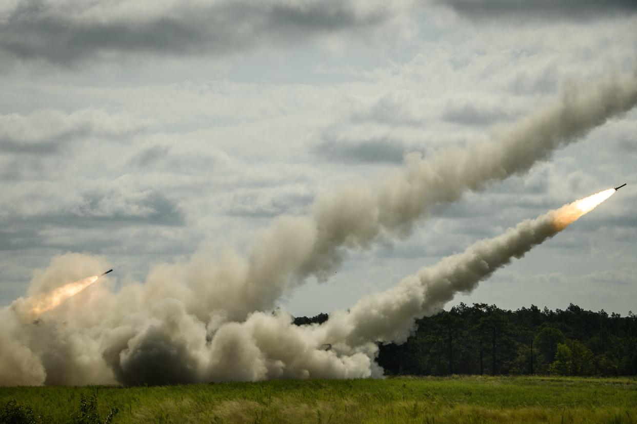 Soldiers, with 18th Field Artillery Brigade, fire of rockets from three High Mobility Artillery Rocket System during a training exercise in July 2022.