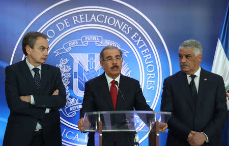 Former Spanish Prime Minister Jose Luis Rodriguez Zapatero, Dominican Republic's President Danilo Medina and Dominican Republic's Chancellor Miguel Vargas talk to the media after a meeting in Santo Domingo, Dominican Republic February 7, 2018. REUTERS/Ricardo Rojas