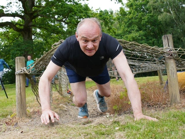 Sir Ed Davey on an assault course 