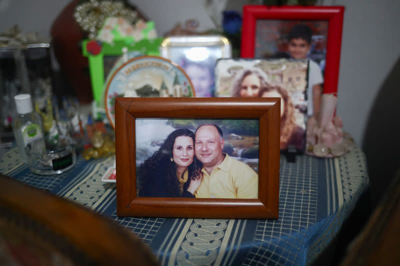 A photograph of the missing silo employee Ghassan Hasrouty pictured with his wife Ibtissam in the family home, following Tuesday's blast in Beirut's port area