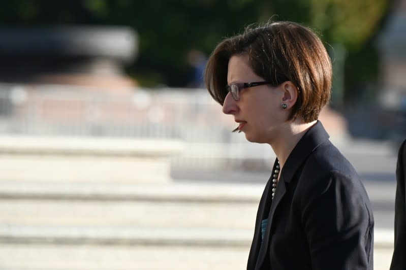 Deputy Assistant Secretary of Defense Laura Cooper arrives to testify in a closed-door deposition as part of the impeachment inquiry in Washington