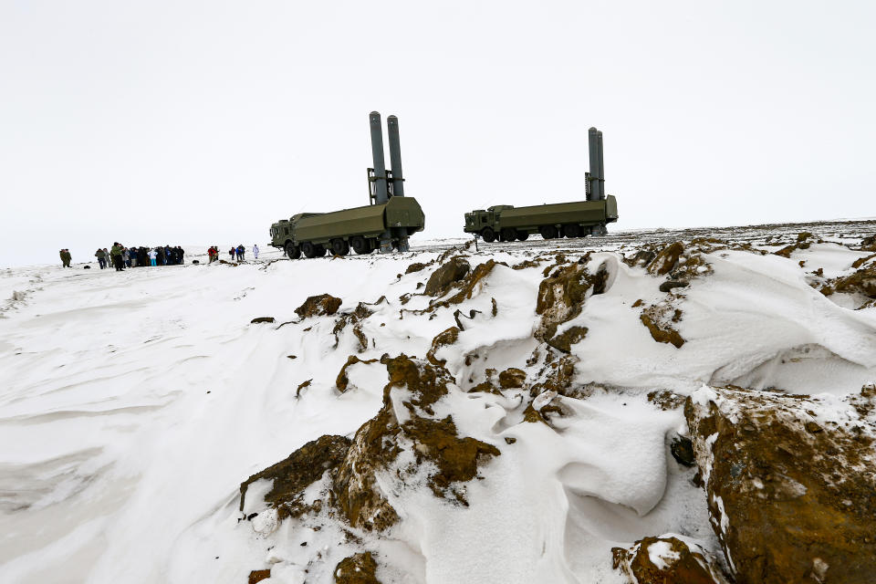 International journalists on a rare trip organized by Russian Defense Ministry watch as the Bastion anti-ship missile systems take positions on the Alexandra Land island near Nagurskoye, Russia, Monday, May 17, 2021. Bristling with missiles and radar, Russia's northernmost military base projects the country's power and influence across the Arctic from a remote, desolate island amid an intensifying international competition for the region's vast resources. Russia's northernmost military outpost sits on the 80th parallel North, projecting power over wide swathes of Arctic amid an intensifying international rivalry over the polar region's vast resources. (AP Photo/Alexander Zemlianichenko)