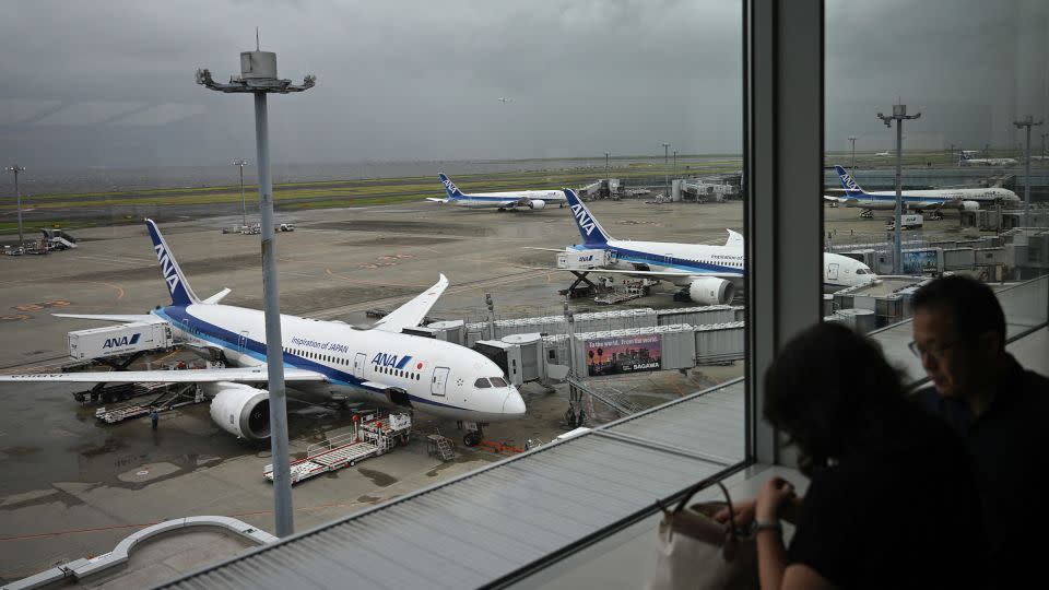 Airlines canceled flights as the storm approached Japan. – Philip Fong/AFP/Getty Images