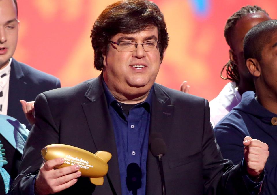 Dan Schneider accepts the lifetime achievement award at the 27th annual Kids' Choice Awards at the Galen Center on Saturday, March 29, 2014, in Los Angeles.