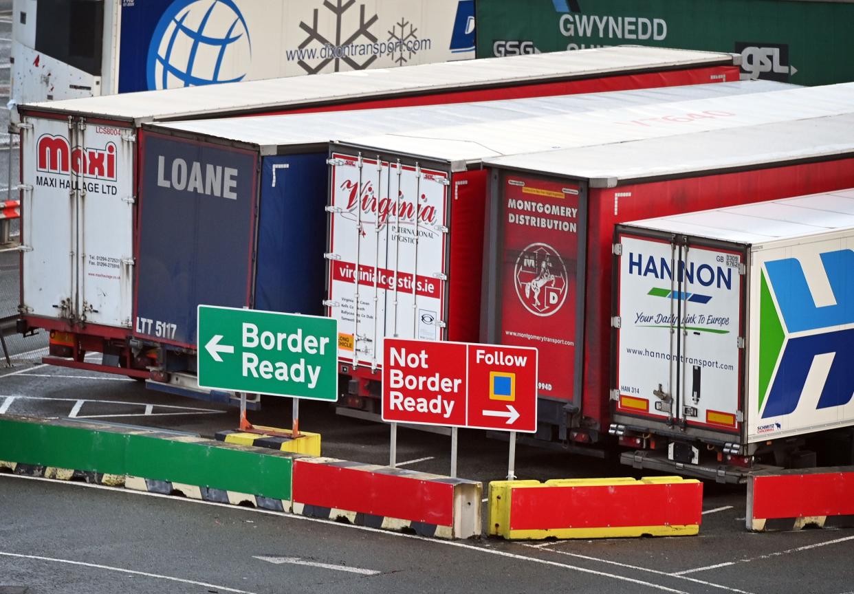<p>Lorries waiting to travel to Ireland via Holyhead port in Anglesey</p> (AFP/Getty)