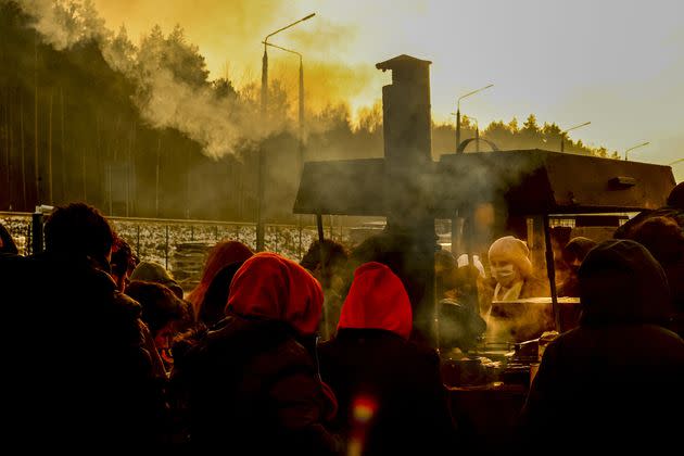 GRODNO REGION, BELARUS - NOVEMBER 28: Migrants continue to wait at a closed area allocated by Belarusian government the Belarusian-Polish border in Grodno, Belarus on November 28, 2021. The migrant crisis on the border of Belarus with Poland, Lithuania, and Latvia escalated on November 8. This year, Polish border guards have prevented more than 35,000 attempts to illegally cross the Polish-Belarusian border, which is 400 times more than last year. (Photo by Sefa Karacan/Anadolu Agency via Getty Images) (Photo: Anadolu Agency via Getty Images)