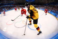 <p>Patrick Hager #50 of Germany controls the puck in the second period against Alexander Barabanov #94 of Olympic Athletes from Russia during the Men’s Gold Medal Game on day sixteen of the PyeongChang 2018 Winter Olympic Games at Gangneung Hockey Centre on February 25, 2018 in Gangneung, South Korea. (Photo by Jamie Squire/Getty Images) </p>