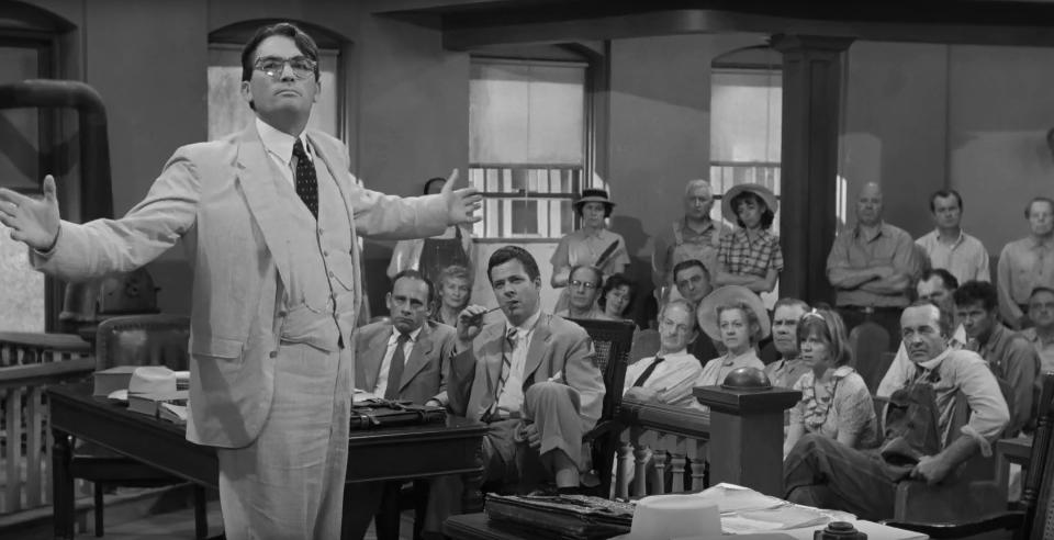 Gregory Peck as Atticus speaking to a courtroom