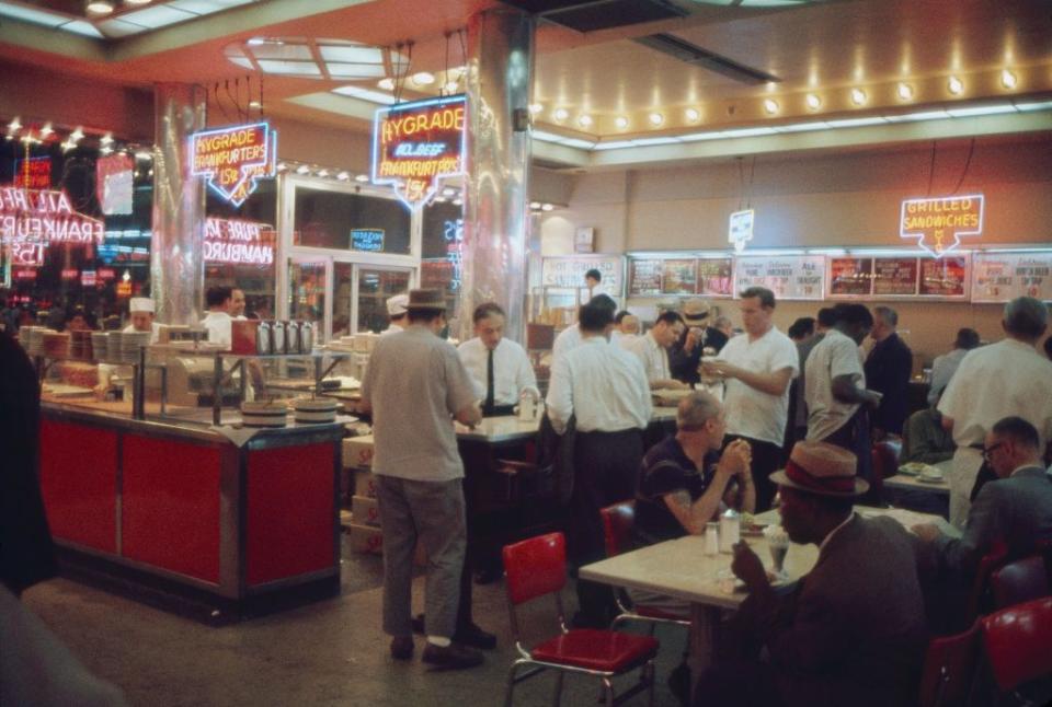 <p>This photo of a lively diner in Times Square is pretty representative of what diners were like in New York in the '60s. Even in the heart of the city, people flocked to them to socialize. </p>