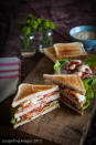 <div class="caption-credit"> Photo by: JungleFrog Cooking</div><b>Traditional Club Sandwich</b> <br> Even though it's a classic (said to have originated in New York in 1899), the club sandwich can be so difficult to get right. That perfect combination of toasted crispy bread, bacon, lettuce, chicken or turkey, tomato, a good mayo and egg is a challenge, but one worth undertaking... and I'd definitely recommend trying it out with your leftover ham. <br> <a href="http://www.babble.com/best-recipes/10-sandwiches-for-leftover-holiday-ham/#traditional-club-sandwich" rel="nofollow noopener" target="_blank" data-ylk="slk:Get the recipe;elm:context_link;itc:0;sec:content-canvas" class="link "><i>Get the recipe</i></a> <br>