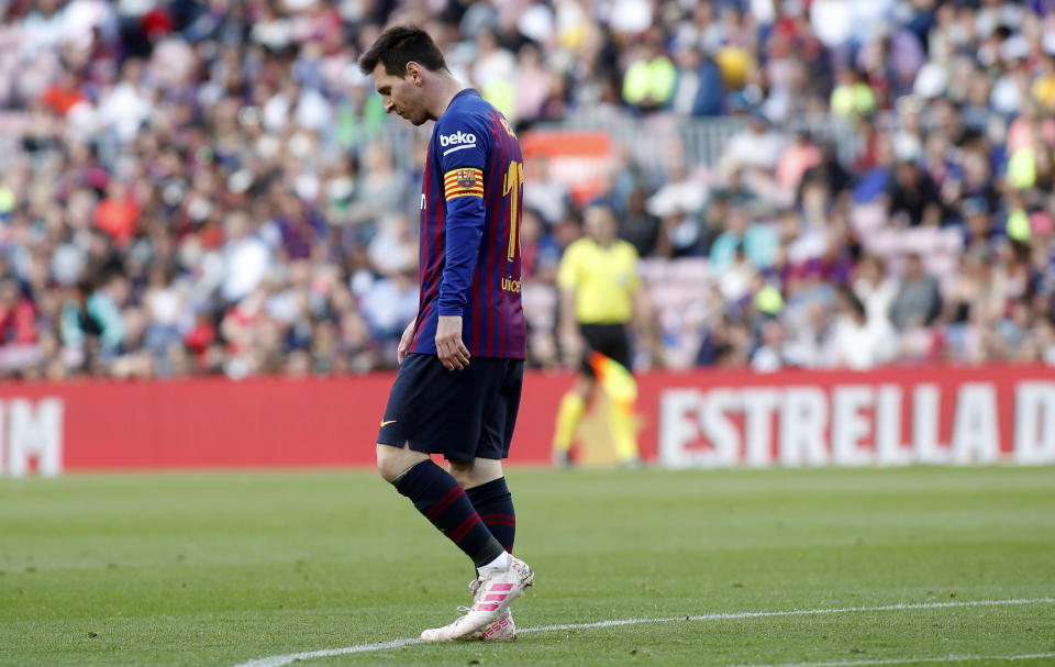 Barcelona forward Lionel Messi walks during the Spanish La Liga soccer match between FC Barcelona and Getafe at the Camp Nou stadium in Barcelona, Spain, Sunday, May 12, 2019. (AP Photo)