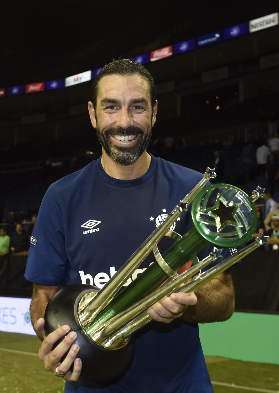 France’s Robert Pires after winning the cup.