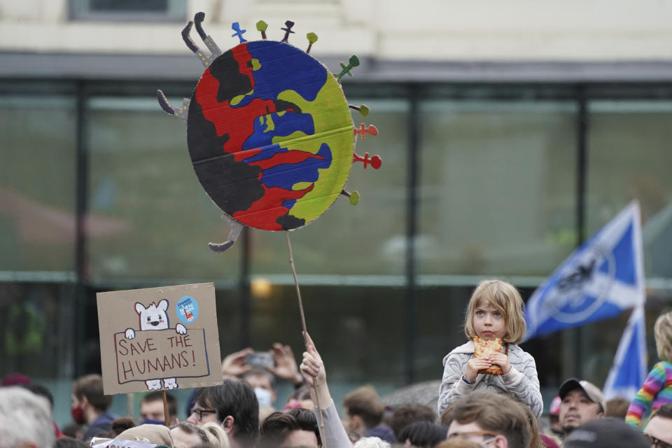 Climate activists march through the streets of Glasgow, Scotland, Friday, Nov. 5, 2021 which is the host city of the COP26 U.N. Climate Summit. The protest was taking place as leaders and activists from around the world were gathering in Scotland's biggest city for the U.N. climate summit, to lay out their vision for addressing the common challenge of global warming. (AP Photo/Jon Super)