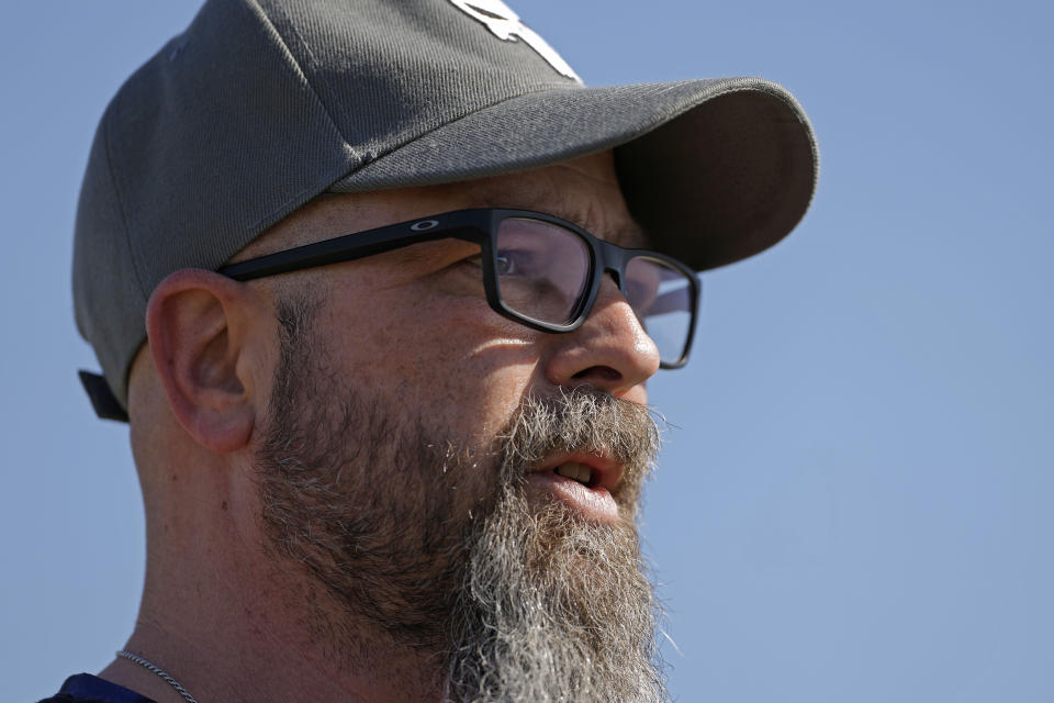 Dusty Farr talks about his efforts to fight bathroom bans after his transgender daughter while visiting a park with his daughter near Smithville, Mo., Sunday, Feb. 25, 2024. Farr is suing the Platt County School District after his daughter was suspended for using the girl's bathroom at the Missouri high school she attended. (AP Photo/Charlie Riedel)