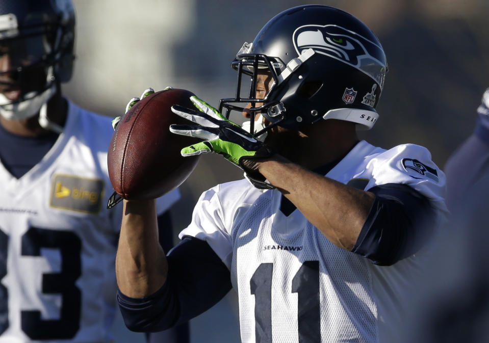 Seattle Seahawks wide receiver Percy Harvin (11) catches the football during warm-up drills before NFL football practice, Thursday, Jan. 23, 2014, in Renton, Wash. The Seahawks will play the Denver Broncos Feb. 2, 2014 in the Super Bowl. (AP Photo/Ted S. Warren)