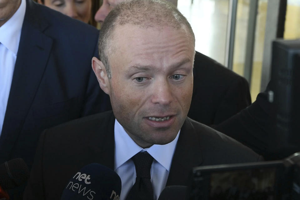 Malta Prime Minister Joseph Muscat talks to reporters in Valletta, Malta, Wednesday, Nov. 20, 2019. Malta authorities arrested prominent businessman Yorgen Fenech, who appears to be a “person of interest” in the assassination of leading investigative reporter Daphne Caruana Galizia, killed by a powerful car bomb in October 2017. (AP Photo/Jonathan Borg)