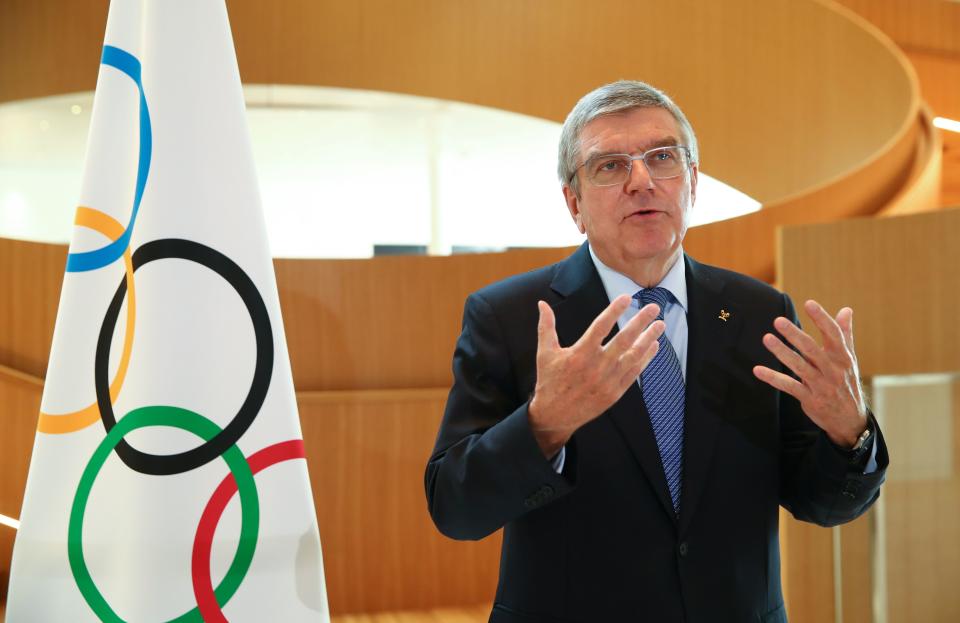 International Olympic Committee (IOC) President Thomas Bach gestures as he speaks during an interview after the historic decision to postpone the 2020 Tokyo Olympic Games due to the coronavirus pandemic, in Lausanne, Switzerland, on March 25, 2020. - Olympic chief Bach says "all options are on the table" over finding a new date to hold the postponed Tokyo Games. Tokyo 2020 became the first Olympics in peacetime to be postponed due to the coronavirus pandemic. Announcing the unprecedented decision on March 24, the International Olympic Committee gave no specific new date, saying only it would be "beyond 2020 but not later than summer 2021". (Photo by Denis Balibouse / POOL / AFP) (Photo by DENIS BALIBOUSE/POOL/AFP via Getty Images)