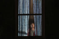 This image released by Netflix shows Amy Adams in a scene from "The Woman in the Window." (Melinda Sue Gordon/Netflix via AP)