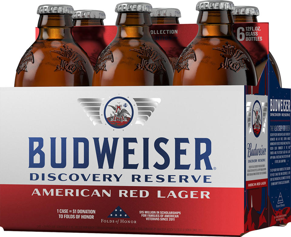 This image provided by Budweiser in June 2019 shows packaging for their Discovery Reserve beer. It revives a recipe from the 1960s and features 11 symbolic stars around their logo, in honor of the 50th anniversary of the Apollo 11 moon landing. (Budweiser via AP)
