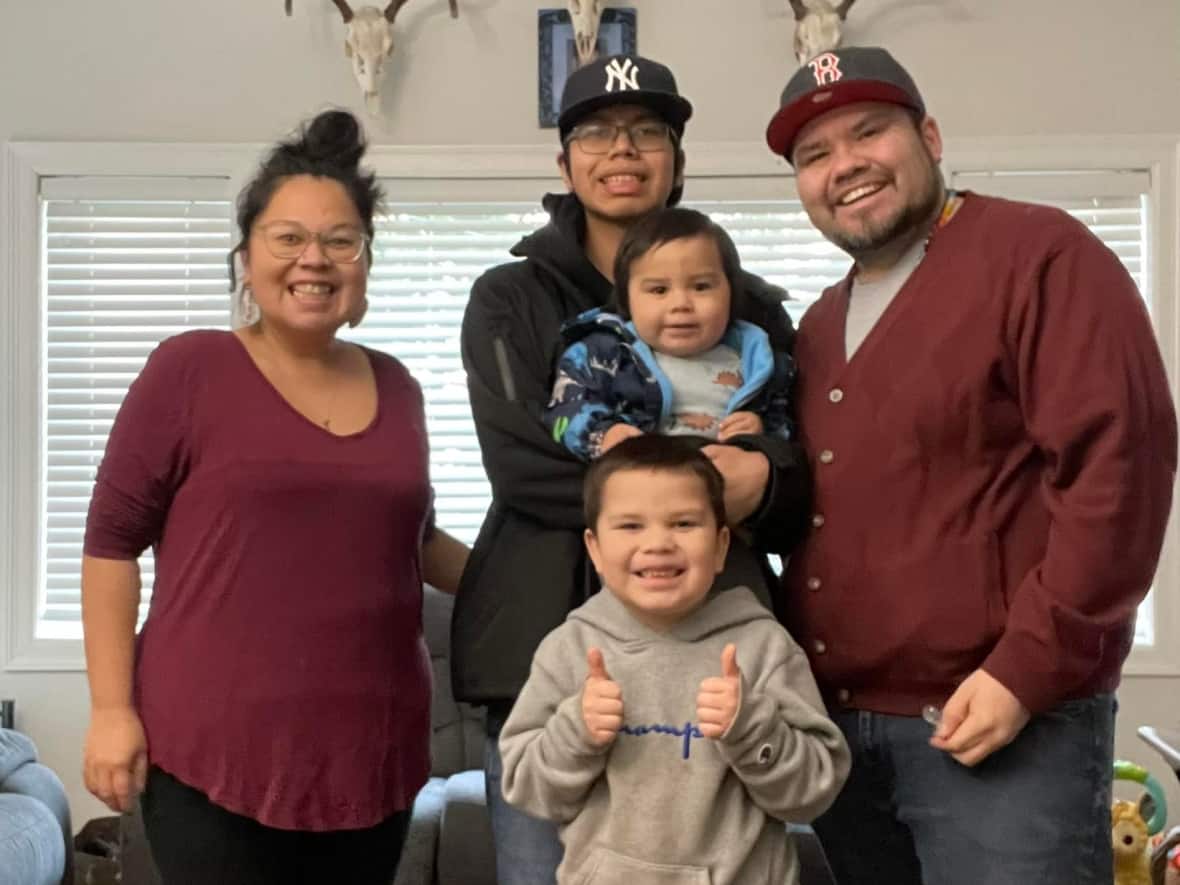 Roxanne Dool (left), Brody Bear (centre), Cody Dool (right) and family have been learning their ancestral language of Halq'eméylem.   (Submitted by: Roxanne Dool - image credit)