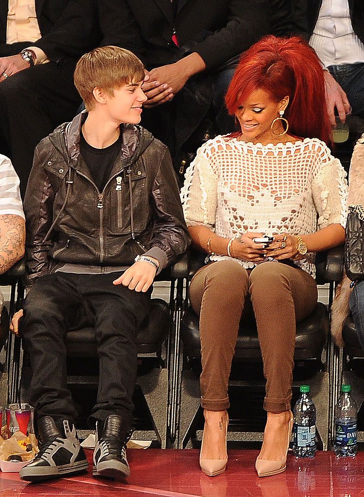 los angeles, ca february 20 singers justin bieber and rihanna sit in the audience during the 2011 nba all star game at staples center on february 20, 2011 in los angeles, california note to user user expressly acknowledges and agrees that, by downloading and or using this photograph, user is consenting to the terms and conditions of the getty images license agreement photo by jason merrittgetty images