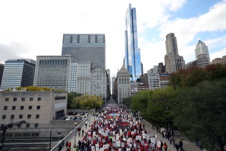 Teachers protest during a rally on the first day of a teacher strike in Chicago