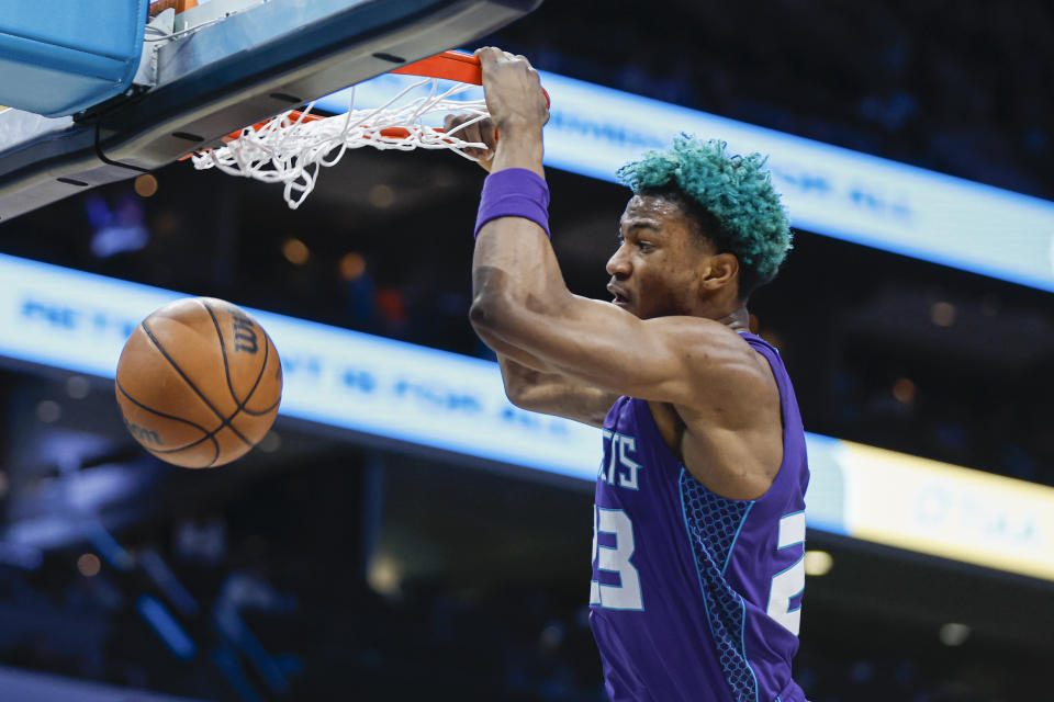 Charlotte Hornets forward Kai Jones dunks against the Toronto Raptors during the first half of an NBA basketball game in Charlotte, N.C., Sunday, April 2, 2023. (AP Photo/Nell Redmond)