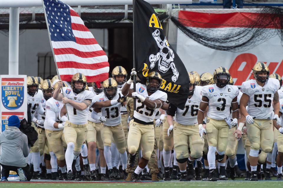 Army Black Knights players enter the field before facing the West Virginia Mountaineers in the 2020 Liberty Bowl.