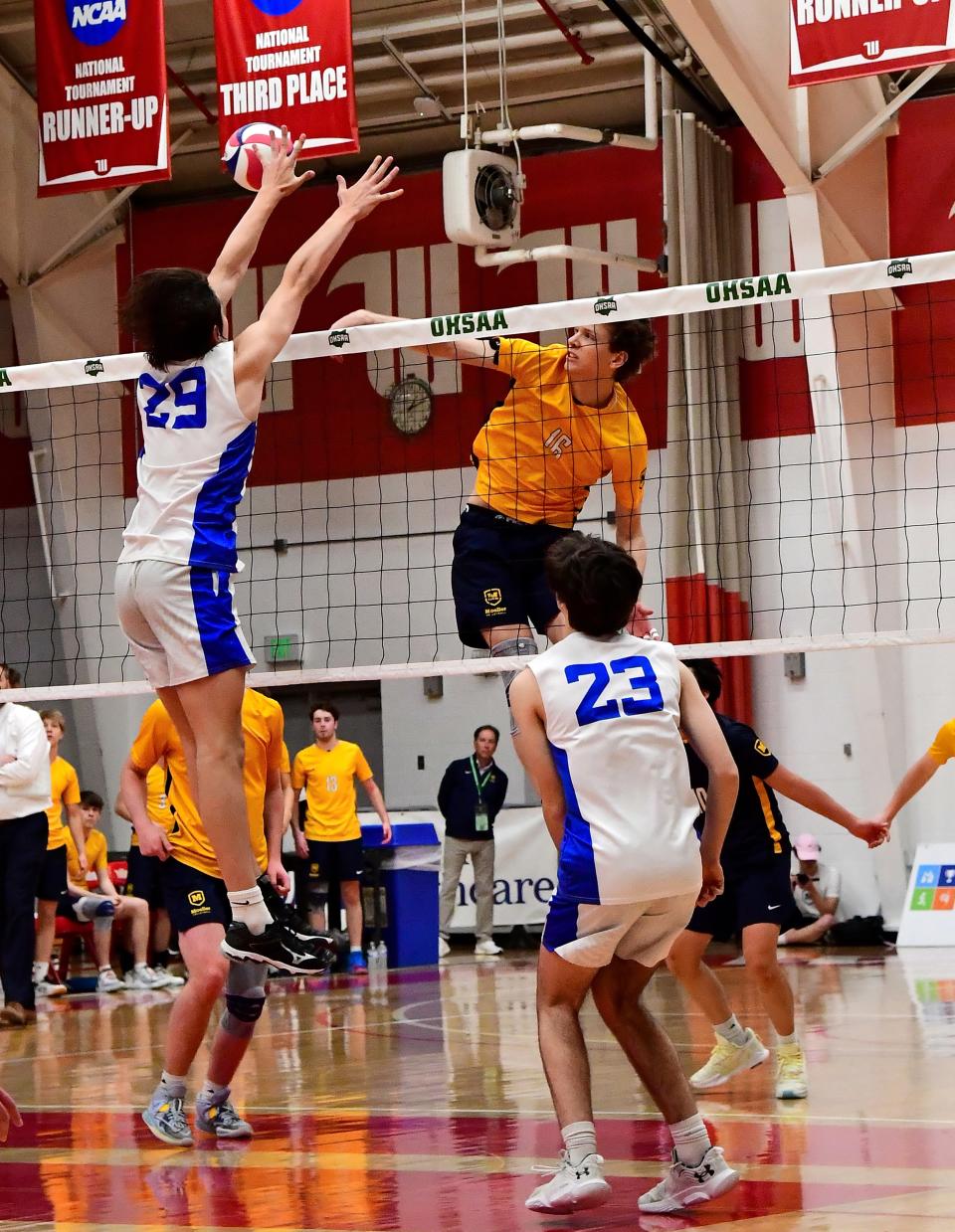 Moeller's Will Patterson spikes and scores on a kill shot at the Inaugural OHSAA Division I Boys Volleyball State Championship, May 28, 2023.