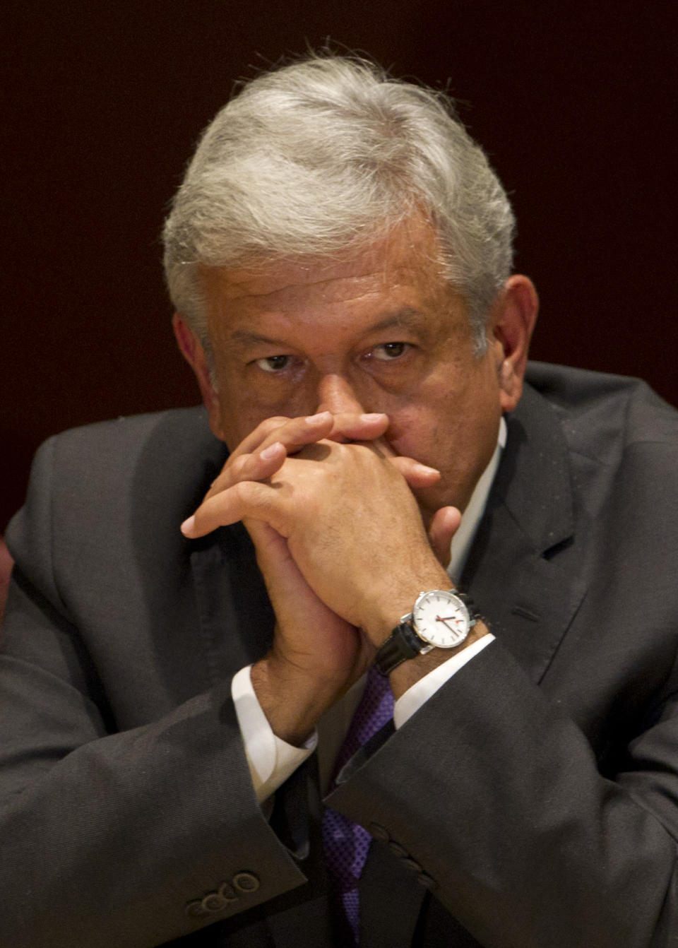 Andres Manuel Lopez Obrador, presidential candidate for the Democratic Revolution Party (PRD), attends a news conference in Mexico City, Thursday, July 12, 2012. Lopez Obrador says he will ask an electoral court to invalidate the results of the July 1 presidential election, charging there was vote buying and campaign overspending by the winner of official vote counts. (AP Photo/Eduardo Verdugo)