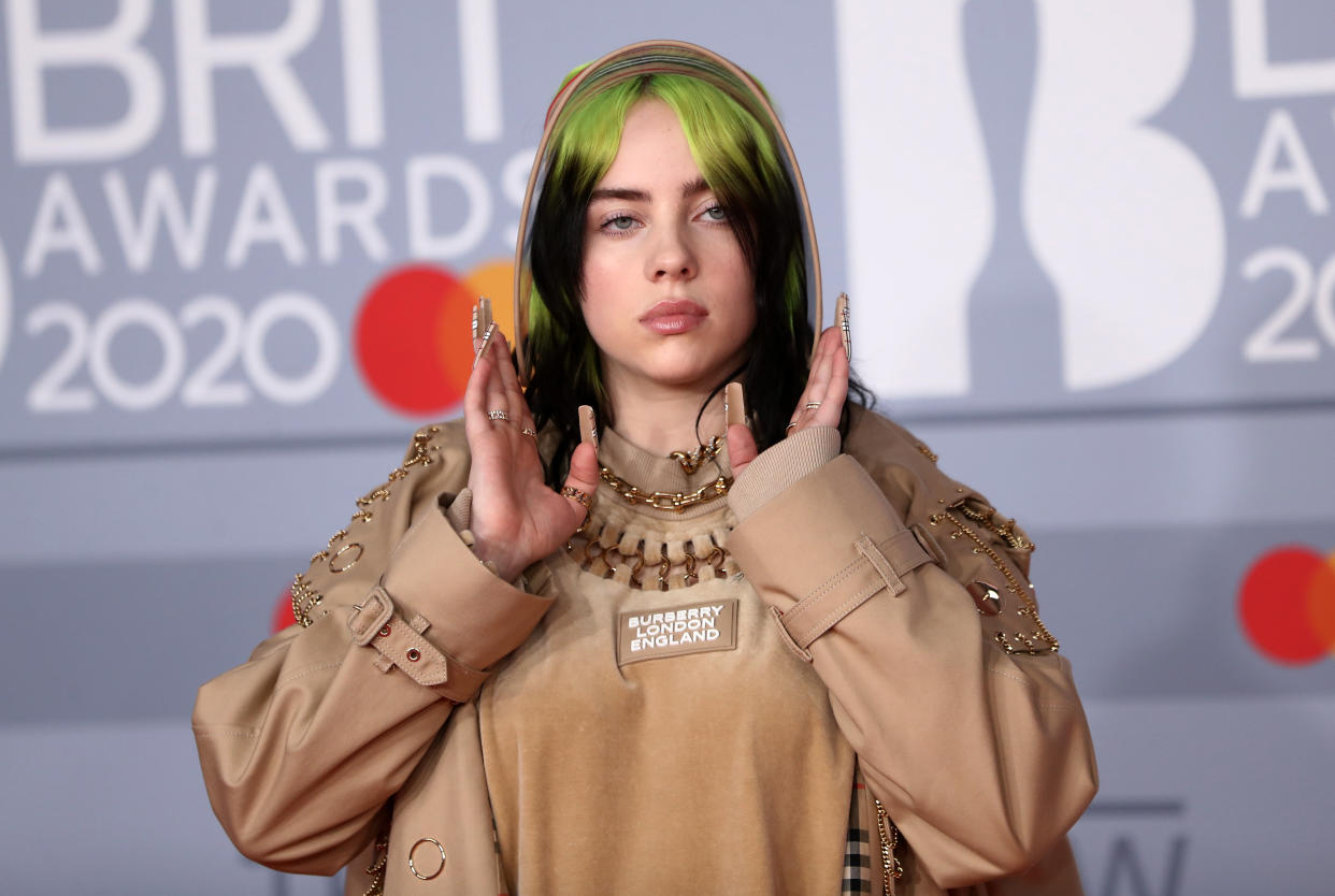 Billie Eilish poses as she arrives for the Brit Awards at the O2 Arena in London, Britain, February 18, 2020 REUTERS/Simon Dawson