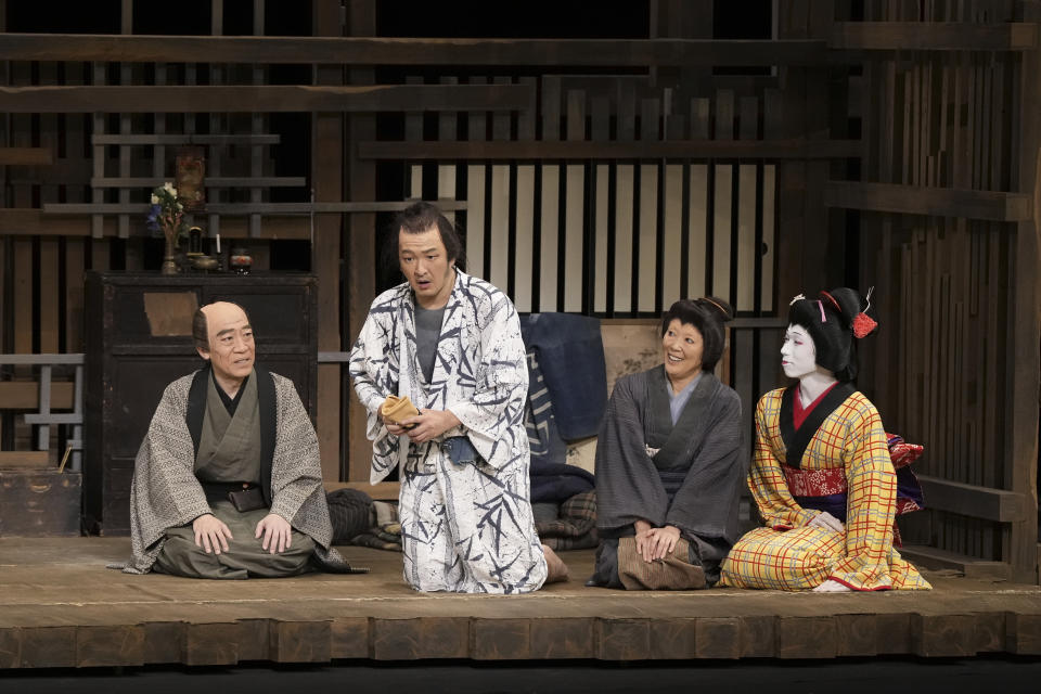 In this photo provided by Shochiku, actors perform in Bunshichi Mottoi Monogatari, presented in English as "The Tale of Bunshichi," at Kabukiza theater in Tokyo, Monday, Oct. 2, 2023. From left are Kamezo Kataoka, as landlord Jinpachi, Shido Nakamura, as Chobe, Shinobu Terajima, as his wife Okane, and Tamataro Nakamura, as their daughter Ohisa. (Shochiku via AP)