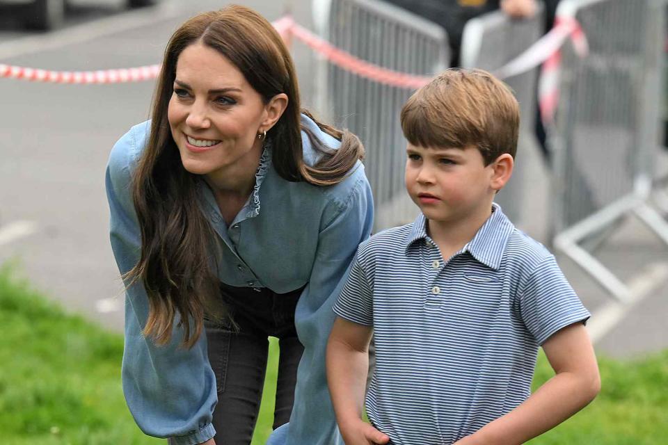 <p>Daniel Leal - WPA Pool/Getty</p> Kate Middleton and Prince Louis at the Big Help Out in May.