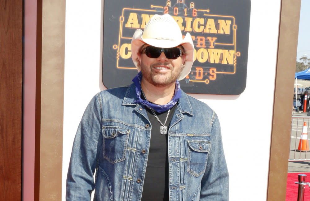 Toby Keith says his stomach cancer battle is ‘pretty debilitating’ credit:Bang Showbiz