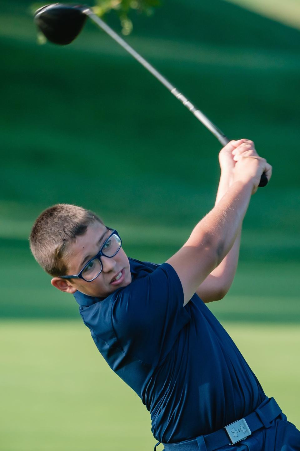 Gavin Gress follows through on his first drive during the First National Bank Junior Golf Tour, Thursday, July 21 at Wilkshire Golf Course in Bolivar.