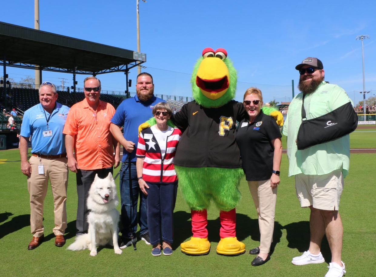 The Seven Seals Award recognizes individual or organizational support for the National Guard and Reserve. From left, Bradenton Administrator Rob Perry; Bradenton Mayor Gene Brown; Todd Hughes of Goodwill's Veterans Services Program; ESGR Florida chair Rita Broadway; Pirates mascot Parrot; Florida ESGR committee member Colleen Trout; and Chad Metcalf of Rapid Response Team.