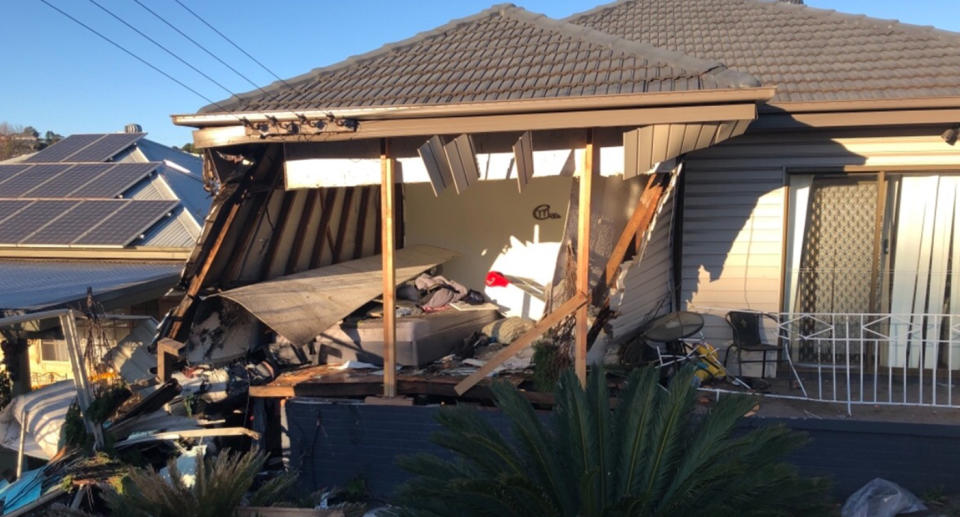 The Lennards' home in Cringila has been destroyed (pictured is one of the rooms completely ruined) and inspectors have found asbestos, leaving the family homeless. 