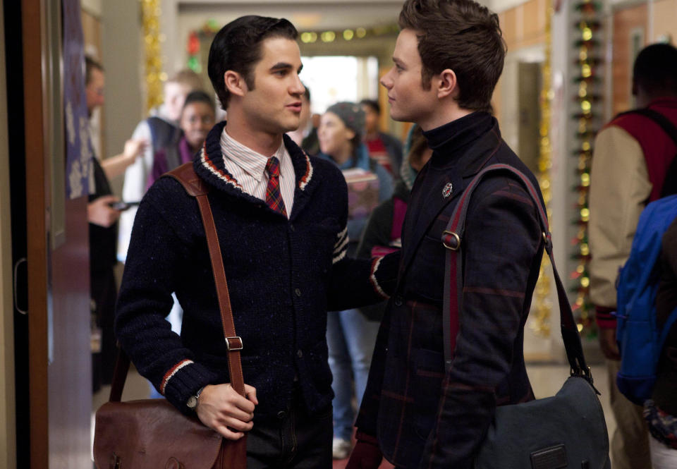 FILE - In this undated file photo provided by Fox, Darren Criss, left, and Chris Colfer are shown in a scene from "Glee." Fox announced Monday, May 14, 2012 that the network is moving "Glee" to Thursday nights in the Fall and turning its Tuesday schedule over entirely to comedies. (AP Photo/FOX, Adam Rose, File)