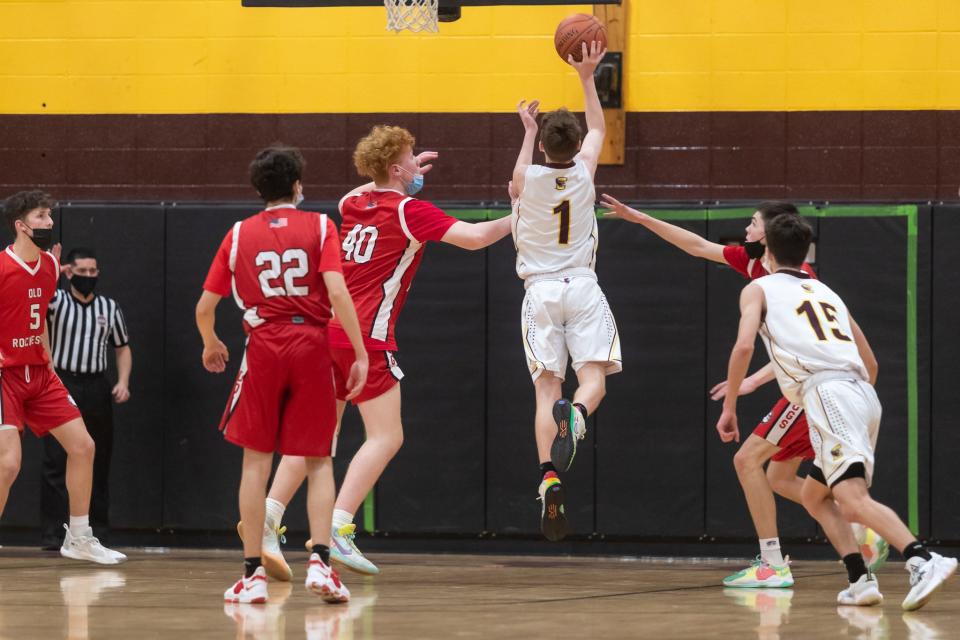 Case’s Landon Cayton connects on a floater through the lane during last season's game against Old Rochester.