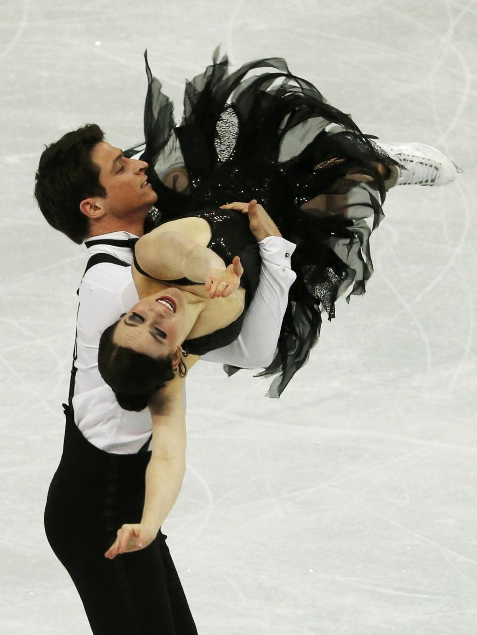 Tessa Virtue and Scott Moir of Canada compete during the Team Ice Dance Short Dance at the Sochi 2014 Winter Olympics