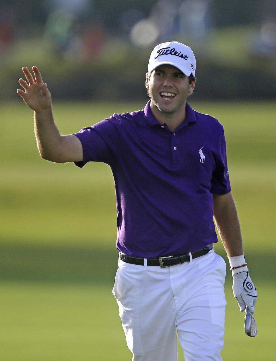 Ben Martin waves after a birdie on the 17th hole during the opening round of the PGA Zurich Classic golf tournament at TPC Louisiana in Avondale, La., Thursday, April 24, 2014. Martin finished the day as the leader at 10-under-par 62 and set a course record for a single round. (AP Photo/Gerald Herbert)