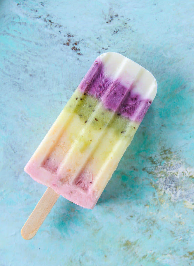 <strong>Get the <a href="http://www.howsweeteats.com/2016/06/fruity-rainbow-froyo-pops/" target="_blank">Fruity Rainbow Froyo Pops recipe</a>&nbsp;from How Sweet It Is</strong>