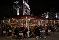 FILE - In this Friday, Oct. 16, 2020 file photo, people eat out in Lille, northern France. France on Friday Oct. 23, 2020 surpassed 1 million confirmed coronavirus cases, becoming the second country in Western Europe after Spain to reach the mark. (AP Photo/Michel Spingler, File)